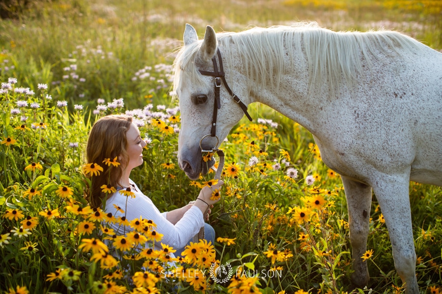 High School Senior Girl with Horse in flowers