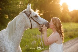 High School Senior Girl kissing Horse
