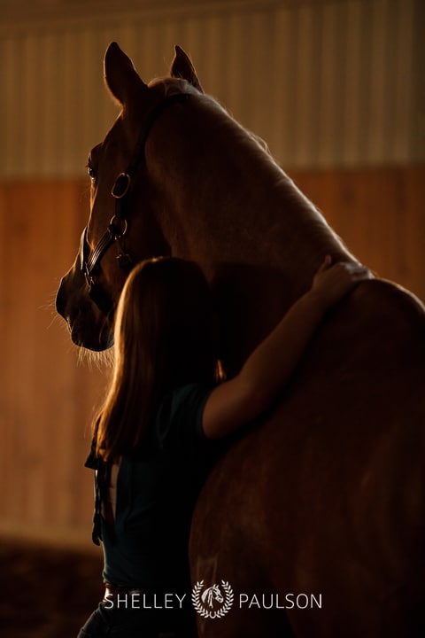 Senior Girl Hugging Horse