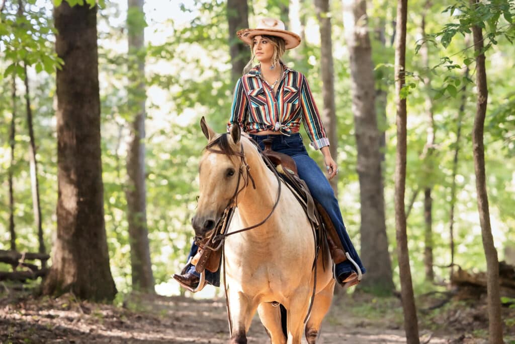 Lainey Wilson & Charlie 1 Horse Unveil Exclusive Hat Line In Las